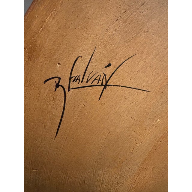 This striking pair of oversized Mexican folk art wall plates is hand-painted and signed by R. Galvan, showcasing bold...