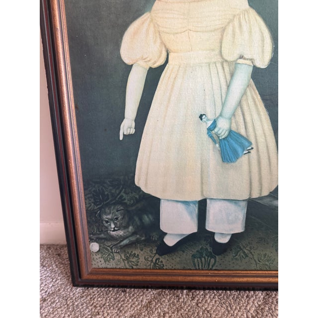 Vintage Folk Art Print On Wood Little Girl Pointing At Cat. Item is in really good condition. Framed print measures at...
