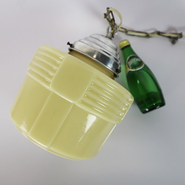 Circa 1930. We offer this Art Deco, pendant light made in milk glass. working at perfection and great vintage conditions.