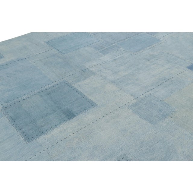 Made with handwoven wool and originating from Turkey circa 1980-90, this 10x13 vintage patchwork rug is a new addition to...