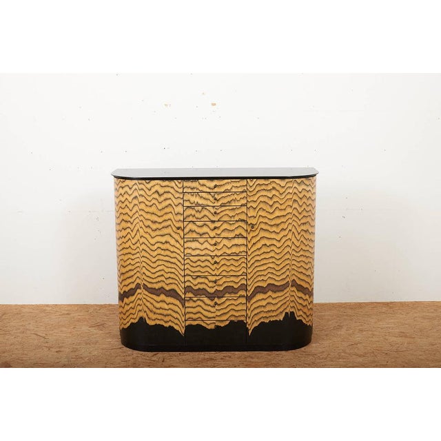 Curtained Sideboard in Tigerwood by Hans Eichenberger, 1980s, in Good conditions. Designed 1980 to 1989 This piece has an...