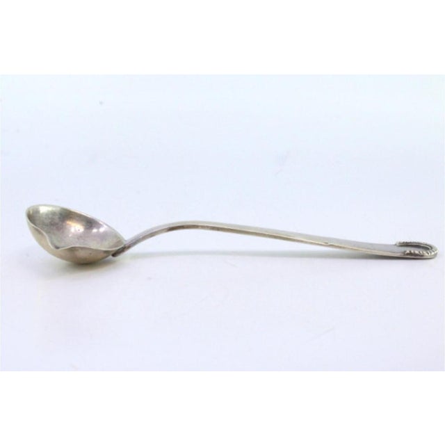 Plain Silver Sauce Spoon with Raised Handle, in Very Good conditions. Designed 1920 to 1949 This piece has an attribution...
