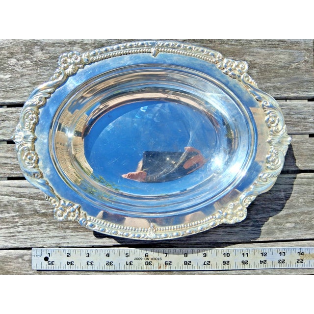 Offered are a HTF pair of vintage matching large Sheridan Silver plated oval serving dishes. The largest one is 14.5x10...