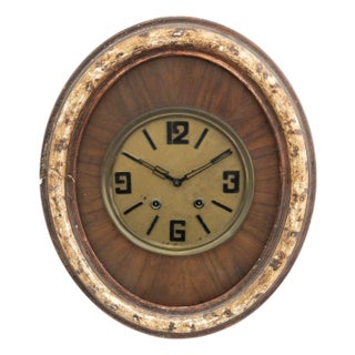 French Art Deco Oval Mahogany and Brass Wall Clock For Sale