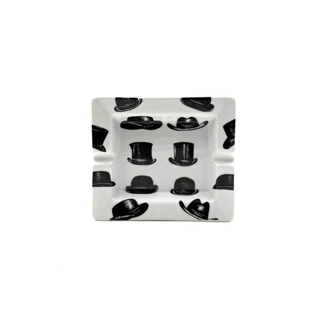Ceramic ashtray, in the manner of Piero Fornasetti France 1970s Top hats pattern H 4 cm - 17 × 19 cm Conditions:...