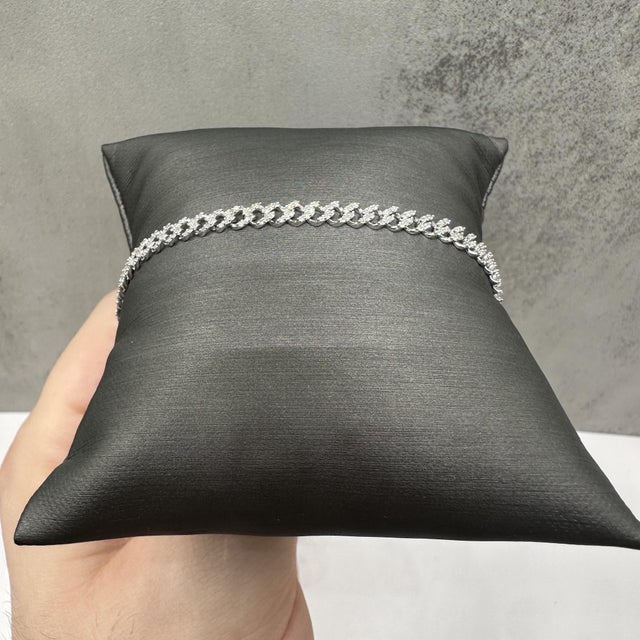 This micro Cuban diamond bracelet in 14kt white gold features 1.18 carats total weight of natural GH SI2–I1 round single...