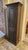This is a very nice distressed dark paint Primitive Style pine tall storage cabinet cupboard with two doors and five...