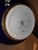 Fine German porcelain vase with beautiful cobalt blue color and gold leaf pattern around the neck.