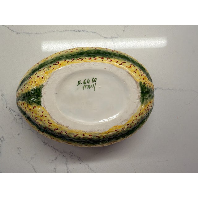 Bring European charm and vibrant botanical beauty to your table with this stunning vintage Italian Majolica melon tureen....