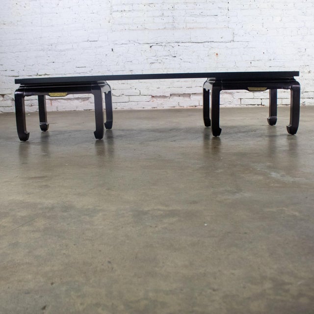 Mid-20th Century double Ming style base coffee table or low profile bench with chow legs, black painted frame, brass...