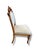 This vintage upholstered side chair features beautifully carved wood detailing, an ornate crest rail, and turned front...