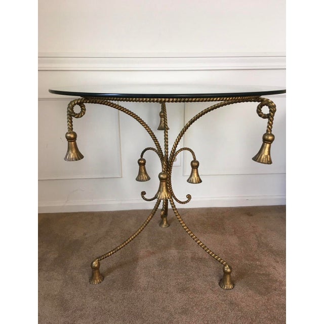 Vintage Hollywood Regency Gilt Metal Rope & Tassel Accent Table w/ round Glass Top. Family lore says acquired latest when...