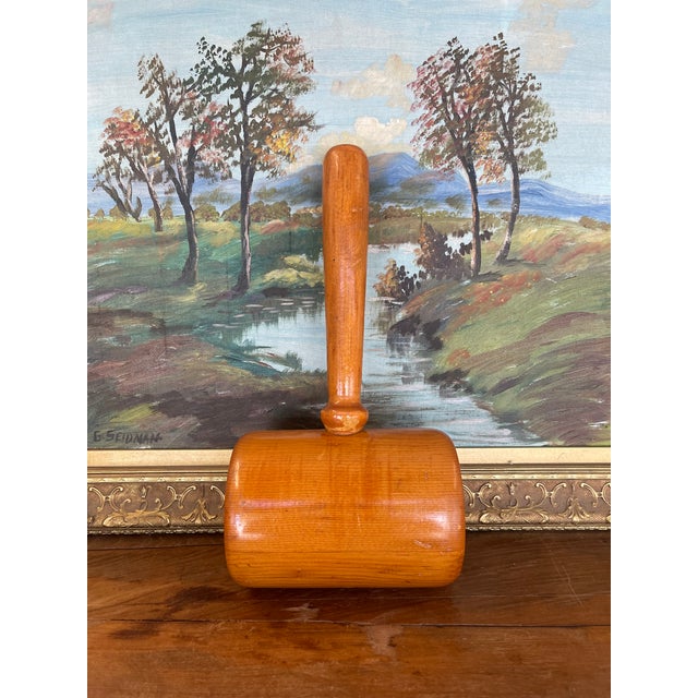 This vintage Hand urned mallet is crafted from solid hardwood and features a classic cylindrical head with a smoothly...