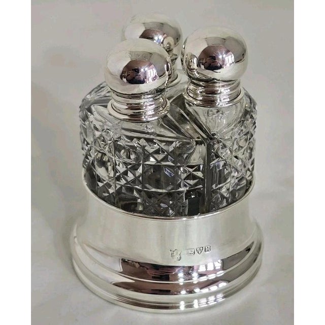 A fine george v crystal cut glass vanity scent bottle set dating to 1923, comprising a pair of beautifully cut bottles...