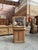 Vintage pine reception desk. It features an upper section with glass panels (glass sides and a acrylic glass front). At...