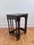 Set of three nesting tables from England 1940s These tables feature turned barley twist legs, a dark wood stained finish,...