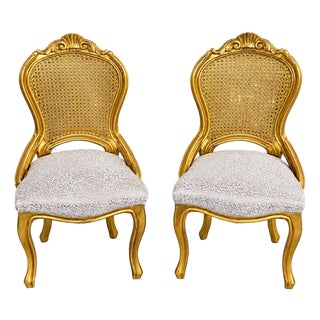 French-Style Side Chairs – Gold Leaf Carved Frames With Woven Backs & Ivory Upholstery, Set of 2 For Sale