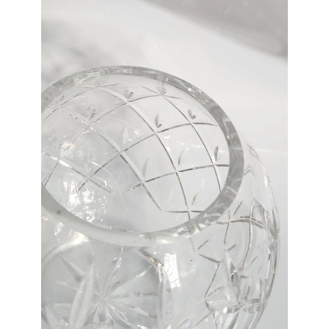 This stunning crystal cut in deep relief pattern. Vase was made by Fabergé. Fabergé is primarily associated with Russia....