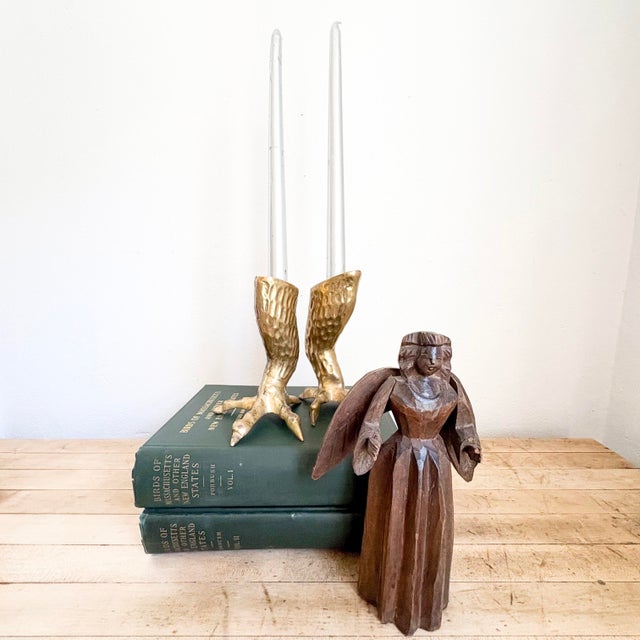 Gorgeous, macabre and elegant, these talon shaped brass candlestick holders are the answer for any tablescape to become...