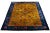 This luxurious antique Peking Chinese hand-knotted wool rug showcases a goldenrod color field embellished with a navy blue...