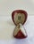This carved wood apple sculpture is signed "C. Colby" and made in Maine, USA, painted a rich red with a natural wood...
