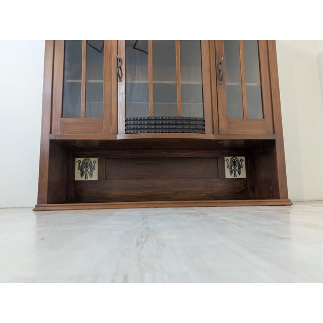 Interwar-style display cabinet, made of oak wood Stylish interwar-style display cabinet, made of oak wood. It features...