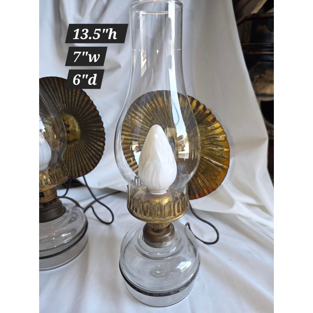 Great looking Primitive kerosene lamps with reflecting tins now converted to electric with bulbs. These can be used as...