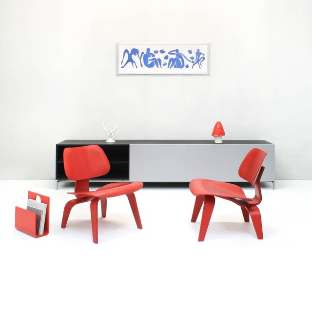 The molded plywood LCW (Lounge Chair Wood) was designed in 1946 by Charles and Ray Eames. These are 2005 Vitra productions...