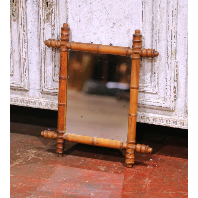 Bring subtle charm and texture to a wall with this antique French faux bamboo mirror, crafted circa 1900. The rectangular...