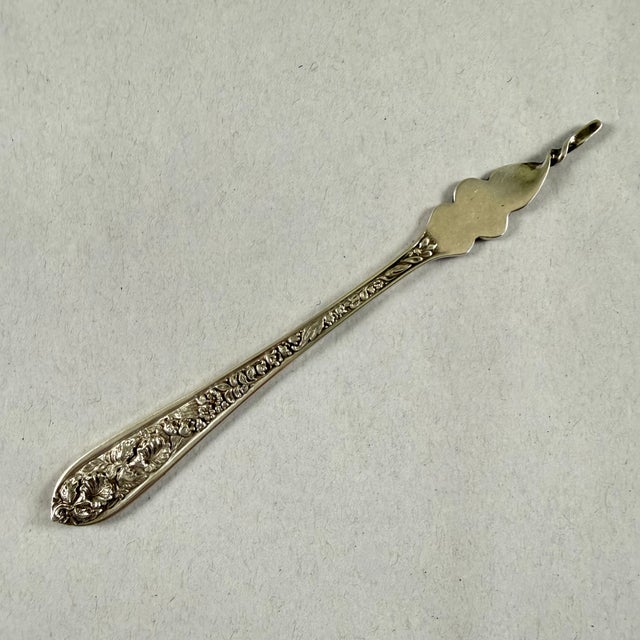 An estate Sterling Silver butter pick in the Corsage pattern produced by Stieff Sterling Company, circa 1935. Corsage by...
