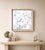 Float No. 26 is a textured abstract black and white painting on canvas with a balanced square composition and a layered,...