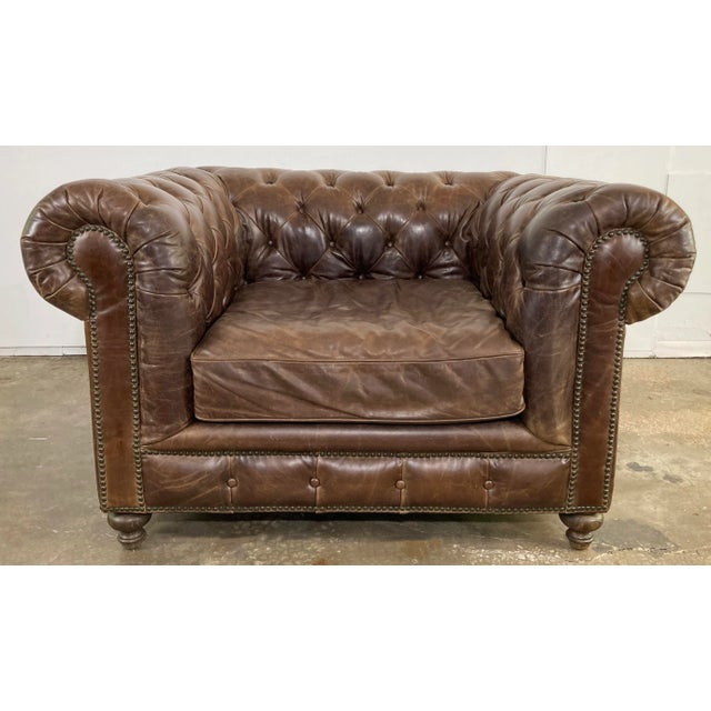 Vintage oversized English Style Chesterfield tufted leather club chair featuring rich tobacco brown tufted leather on back...