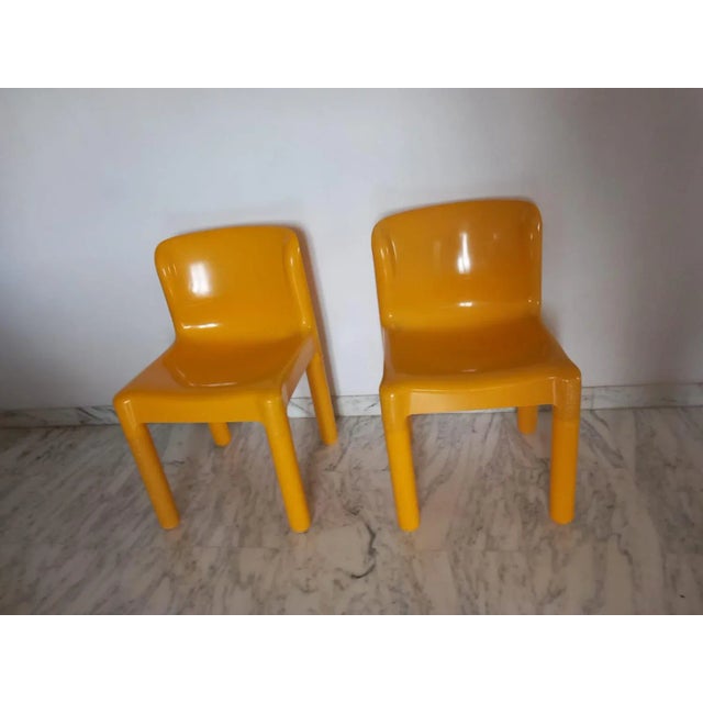Pair of Space Age style monocoque plastic chairs, designed by Carlo Bartoli and produced by Kartell. The production was...