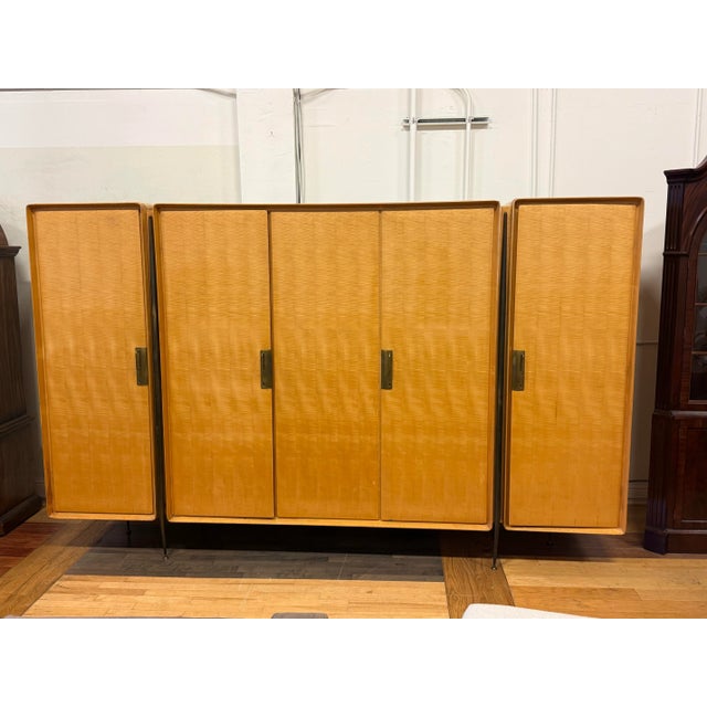 Design Plus Gallery presents an Italian Wardrobe from the Mid 20th Century Attributed to Italian Designer Silvio...