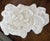 Table is made from a natural tree trunk mold with inlaid fossilized clam shell top. Base is stonecast. Clam shell is a...