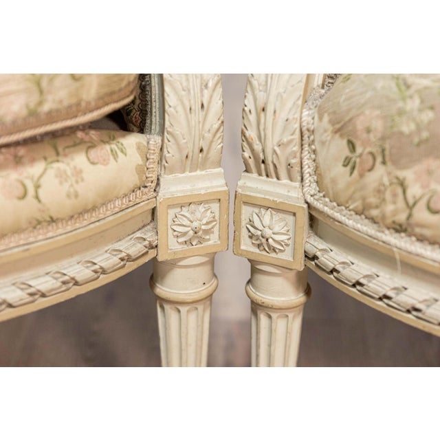 Pair of French Louis XVI Style 1900s Painted and Carved Bergères à Oreilles For Sale In Atlanta - Image 6 of 12