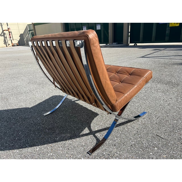 Barcelona' Chrome and Leather Lounge Chair. In the style of Ludwig Mies Van Der Rohe. Chair is confirmed 1970s but...