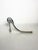 Sculptural shoehorn in polished aluminum, made in France circa 1970. This piece is distinguished by its bold silhouette,...