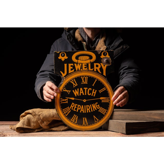 DSP (double-sided porcelain) enamel sign advertising JEWELRY / WATCH REPAIRING, designed in the form of a pocket watch...