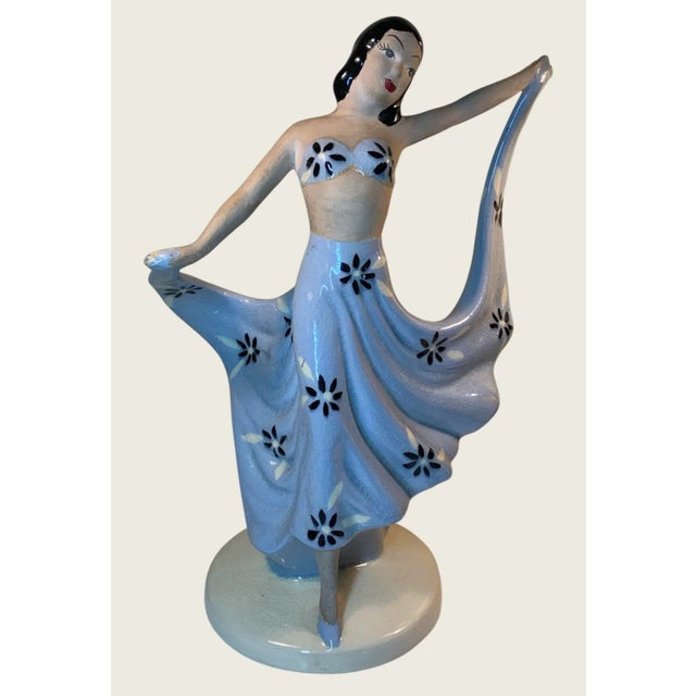 10.5” high, 9” wide, beautiful model, completely hand painted, signed on the underside Padre Regal and by the artist...