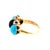 Victorian multi-stone ring. The ring features a purple cabochon amethyst, flanked by blue cabochon turquoise stones....