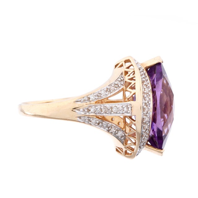 Vintage 14K Gold Purple Amethyst and Diamond Cocktail Ring, size 7.5. Ring features a dramatic faceted amethyst set in...
