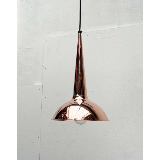 Impressive copper pendant lights from Denmark. The most striking detail of this light is the tapered cone that occupies a...