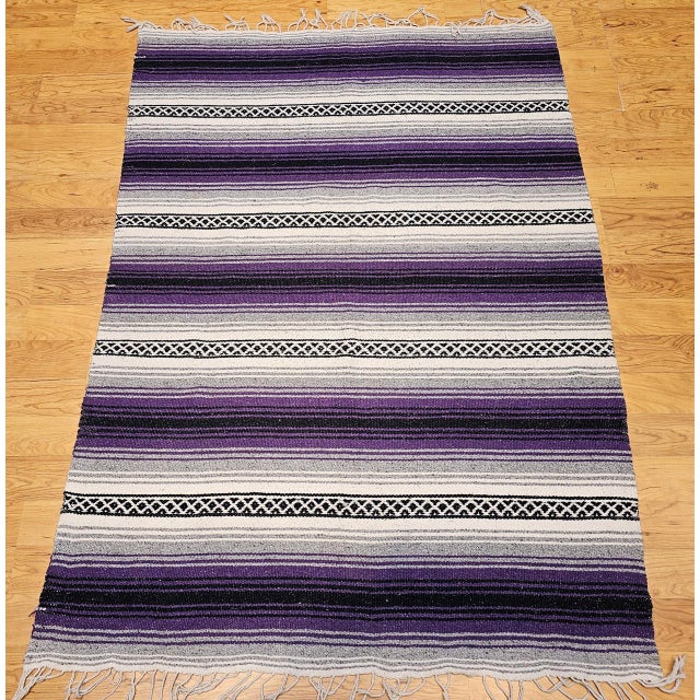 A vibrant American original, this vintage Southwestern kilim was handwoven during the third quarter of the 20th century in...