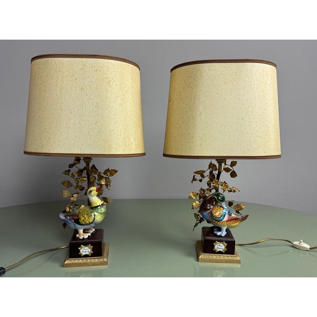 A wonderfully characterful italian mid-century table lamp featuring an exquisitely modelled and hand-painted porcelain...