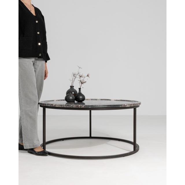 Crafted in France circa 1880, this refined coffee table exemplifies the disciplined elegance of late nineteenth-century...