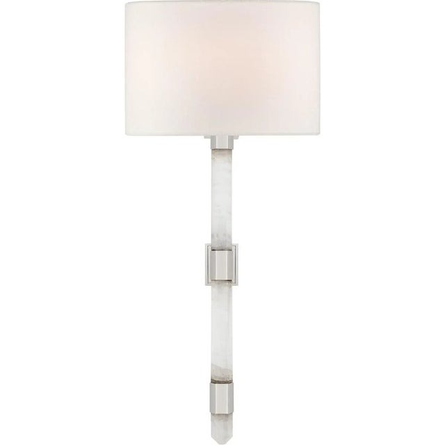 Adaline Medium Tail Sconce in Polished Nickel and Quartz with Linen Shade Designer: Suzanne Kasler Height: 22.25"...