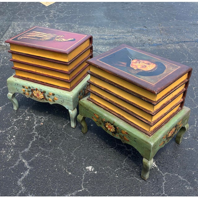 A charming and highly decorative pair of vintage faux book storage end tables dating to the mid 20th century. Designed to...