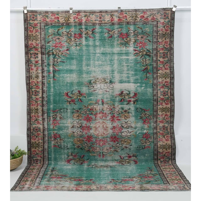 Vintage Hand-Knotted area rug is a semi-antique vintage area rug. The '70s Eastern region of Anatolian's unique rug is...