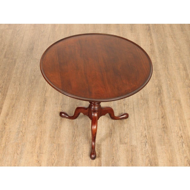 High Quality American Made Solid Mahogany Mahogany Round Tilt-Top Table Raised On Turned Pedestal Base With Tripod Legs....